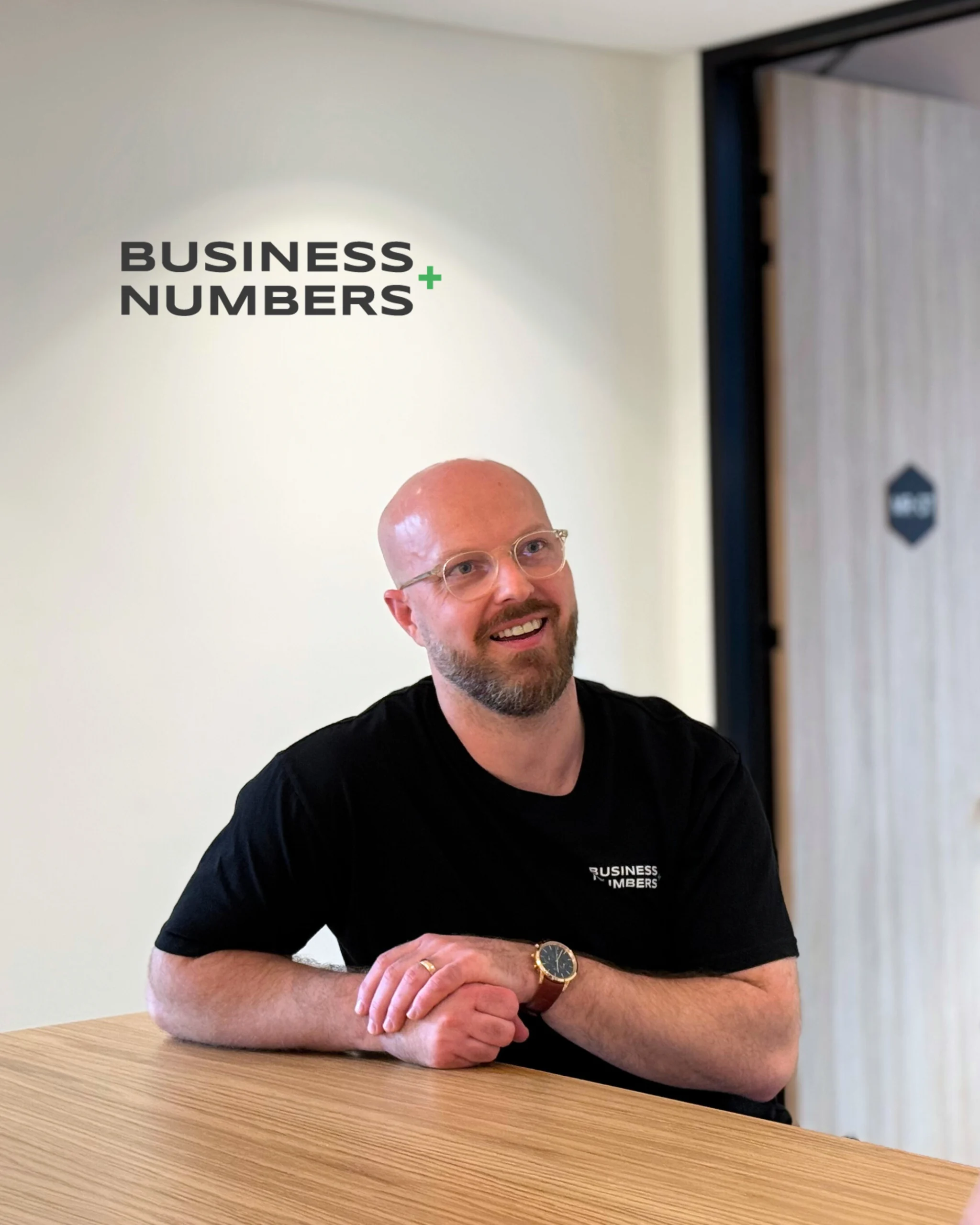 Andrew Holmes in an office
